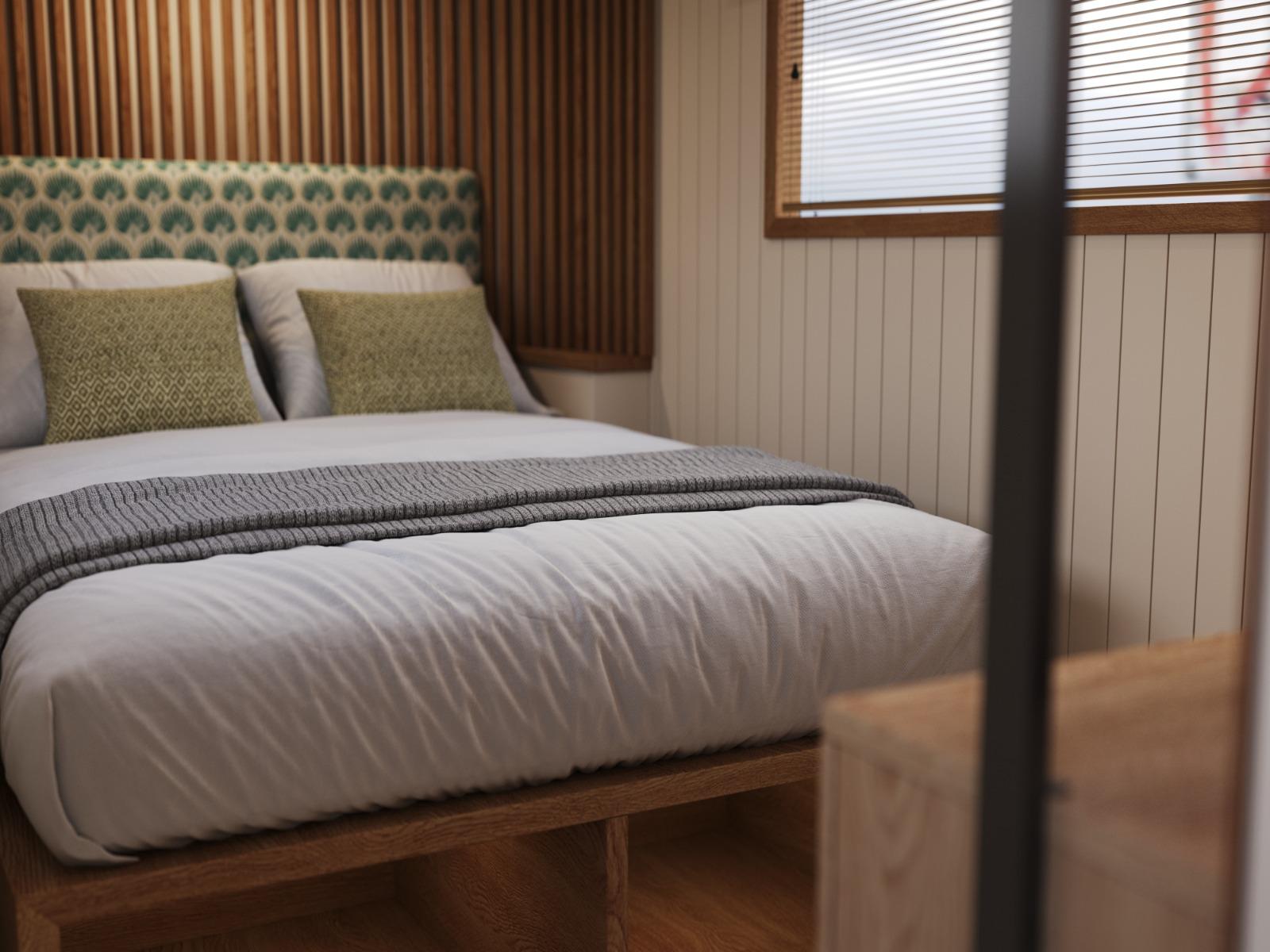 Oakums Bowless bedroom with oak slatted headboard and soft upholstery